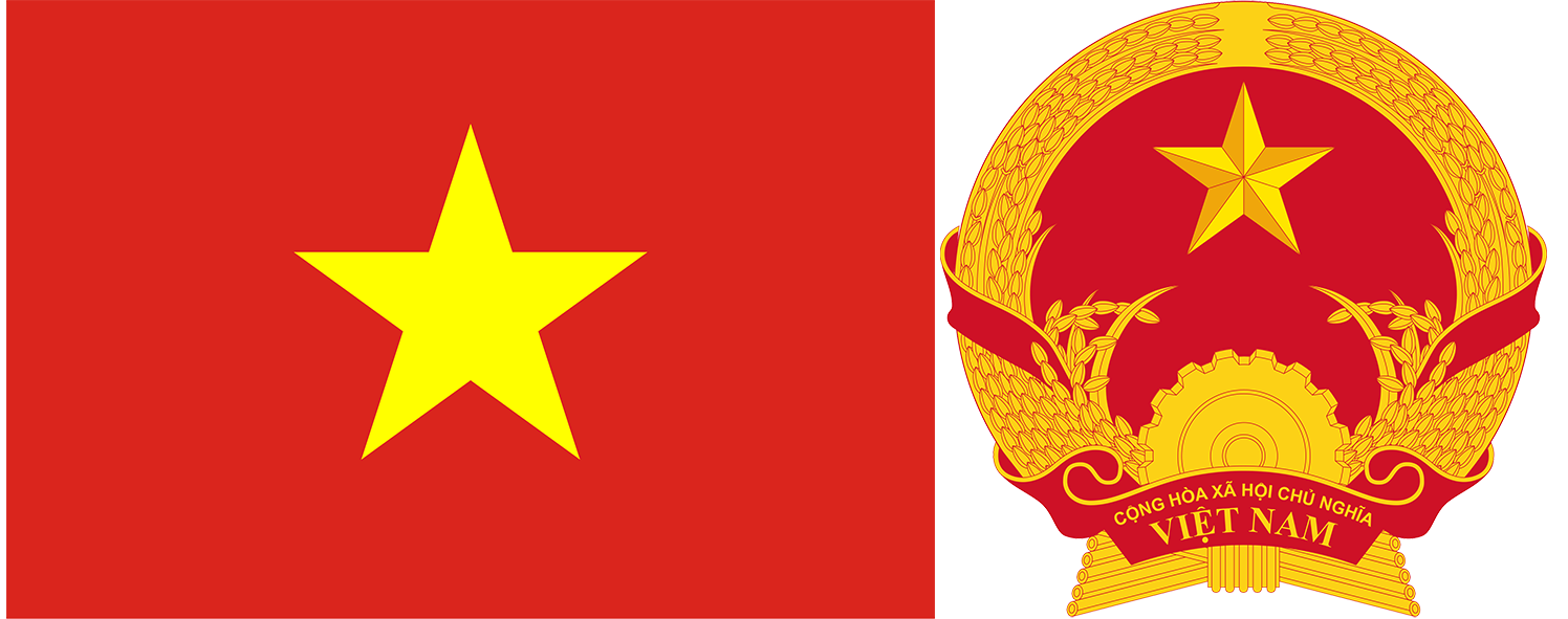 The flag and emblem of Vietnam.