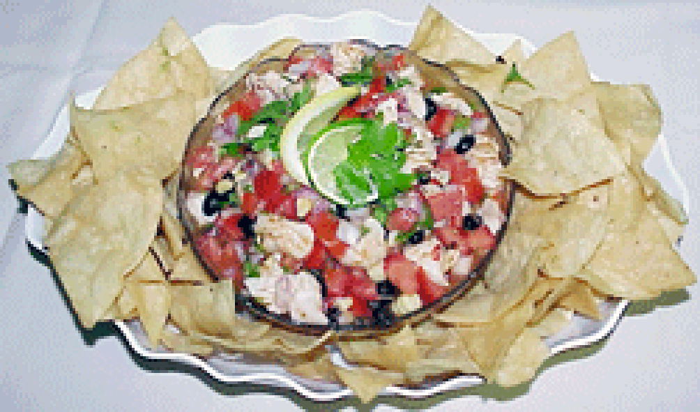 Ceviche: plate of white fish pieces marinated in lime juice