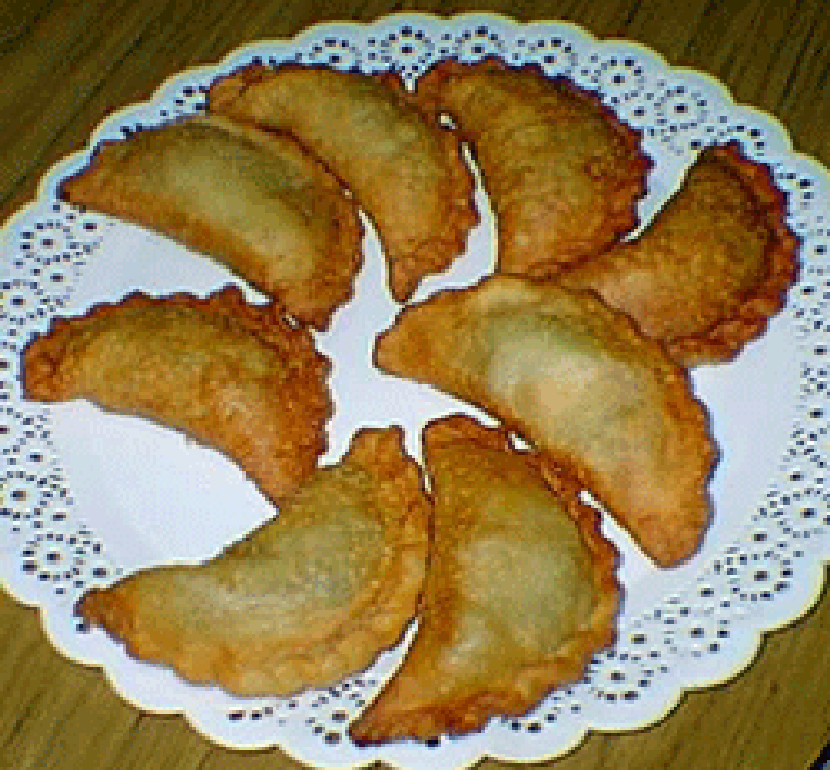Empanada crescents shown arranged in a circle