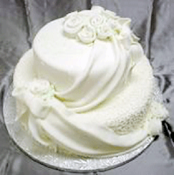 Two layer cake covered in fondant icing