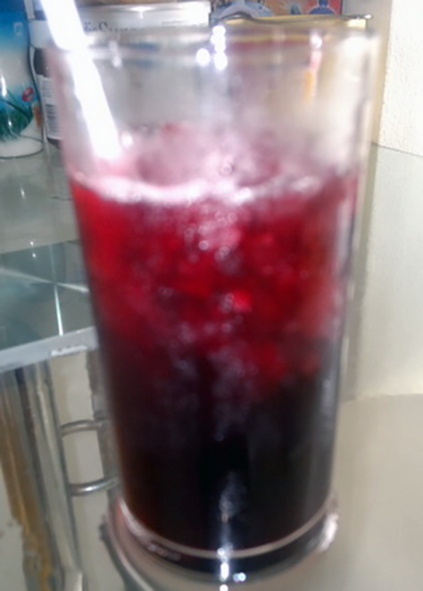 Jus de Bissap; hibiscus flower drink in a glass