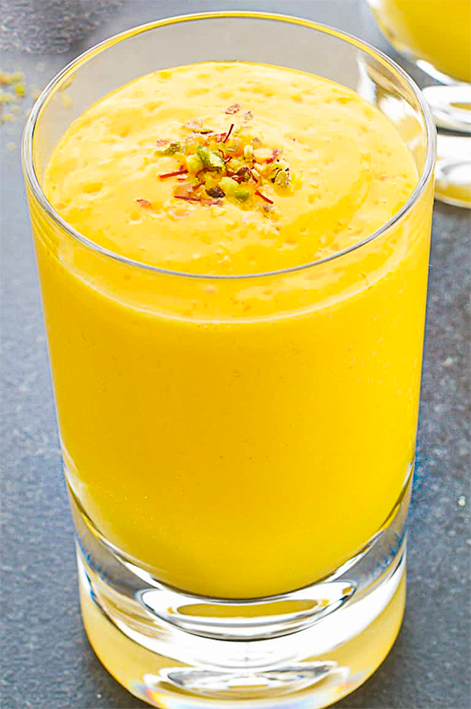 Mango lassi in a tall glass