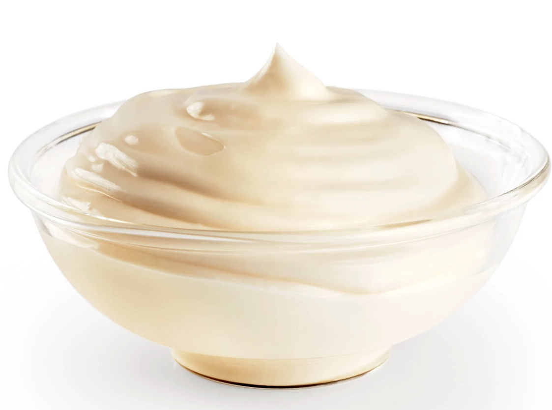 Mayonnaise, a classic stable emulsion piled in a glass dish