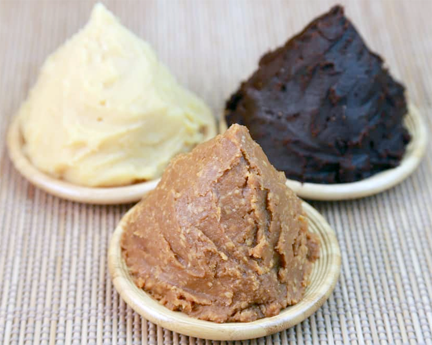 Three colours of miso paste: white, black and brown