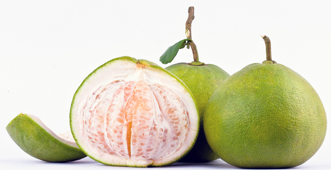 Pomelo peel, part-peeled pomelo showing the inner fruit and whole pomelo