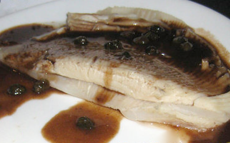 Ray wing served with a beurre noire sauce