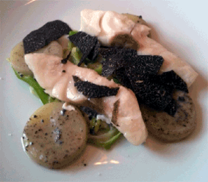 Sea bass Americaine, with shavings of black truffle and rounds of lobster tail