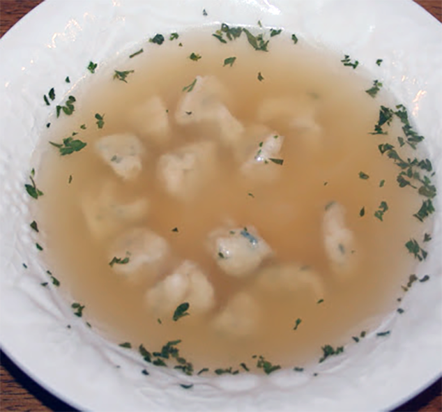 Xavier soup served in a bowl with xavier dumplings