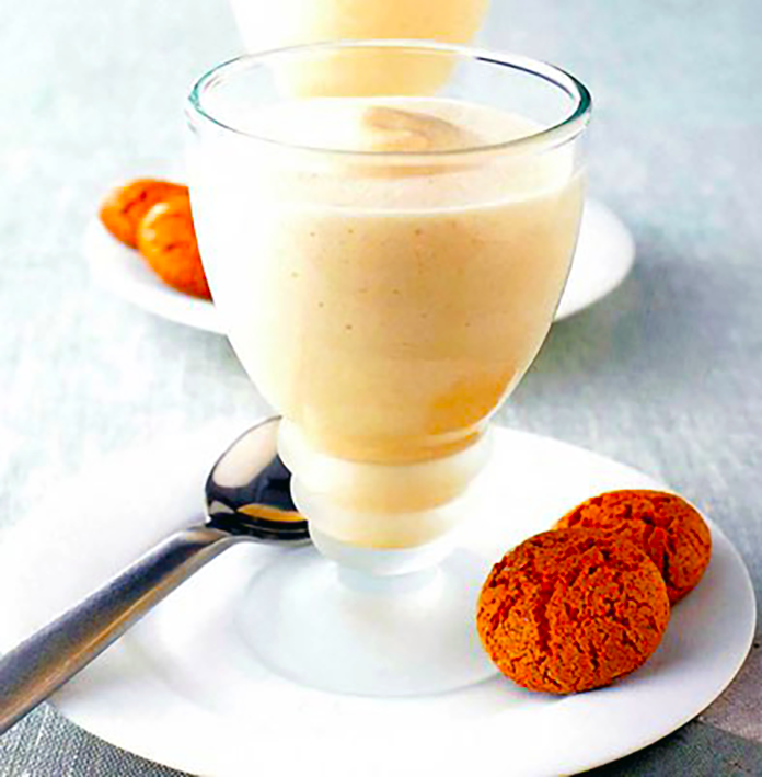 Zabaglione served in a glass with biscotti
