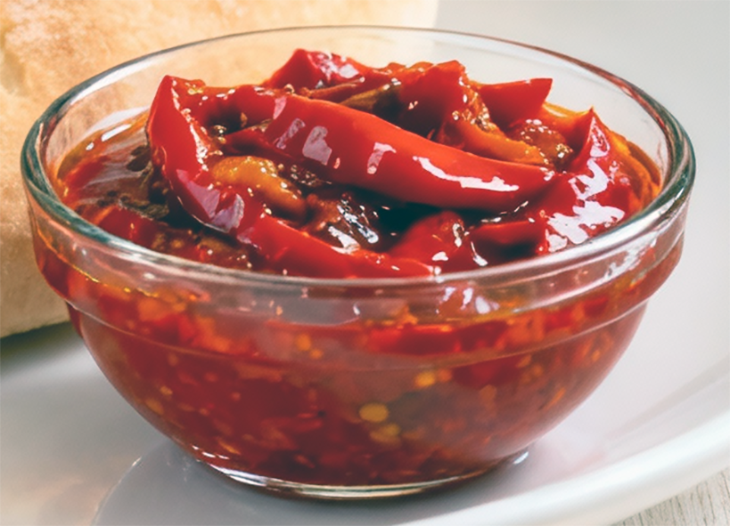 Algerian roast pepper and tomato sauce in a glass bowl
