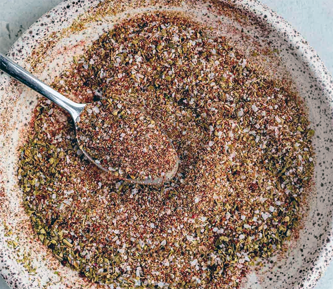 ground tamales seasoning blend in an earthenware bowl