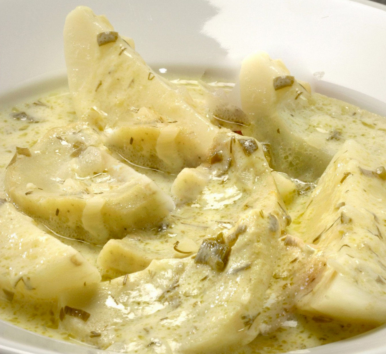 artichokes cooked in avgolemono, egg and lemon sauce served in a soup dish