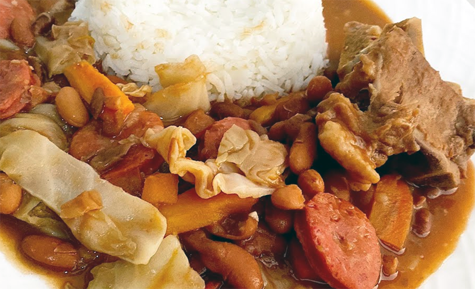 Angolan feijoada bean and cabbage stew served with rice