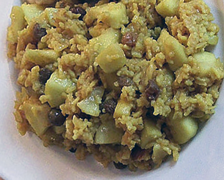 Namibian apple and raisin risotto served on a white plate