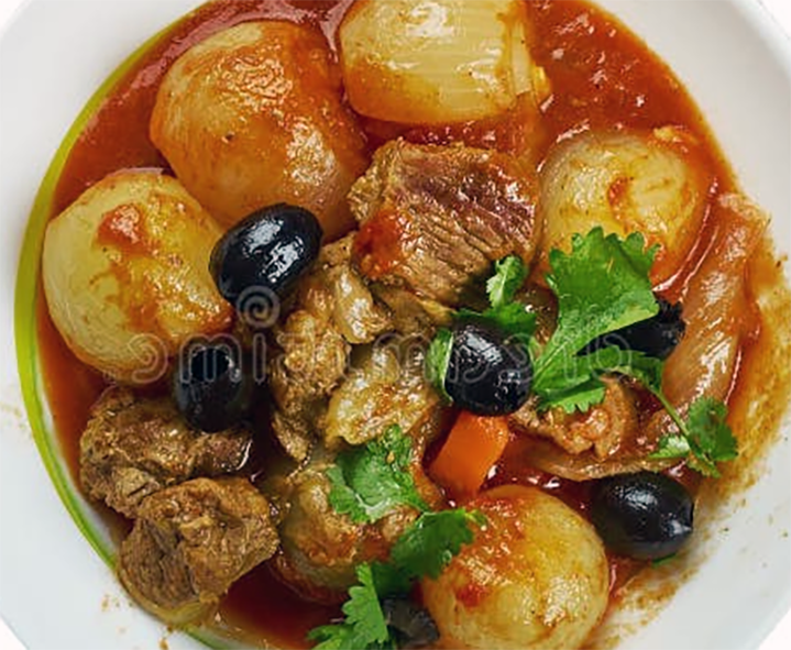 lamb stewed with potatoes and olives in a tomato sauce