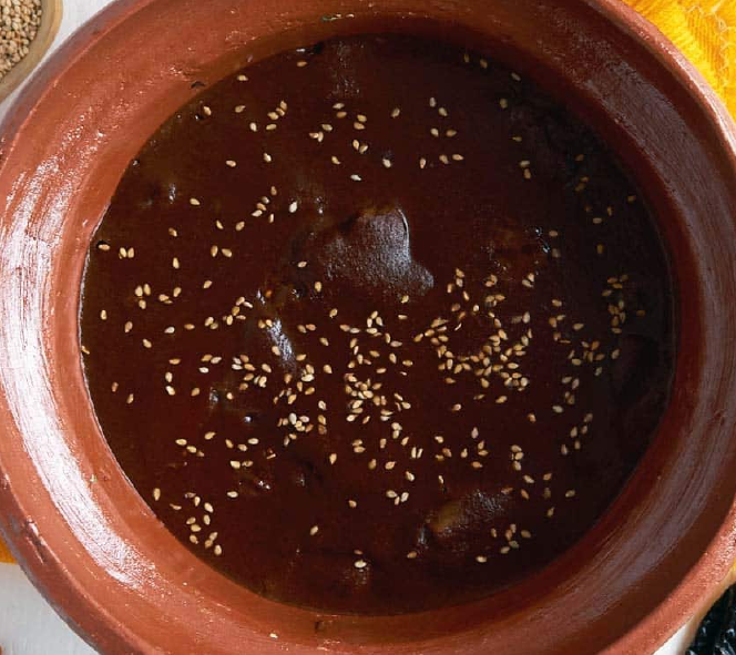 mole poblano sauce in an earthenware dish