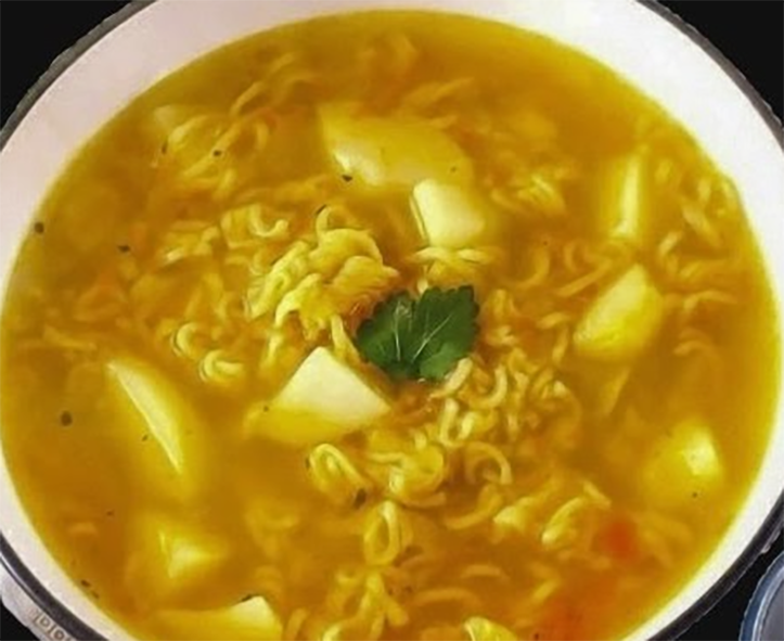 bachelor's soup with potatoes and instant noodles served in a bowl