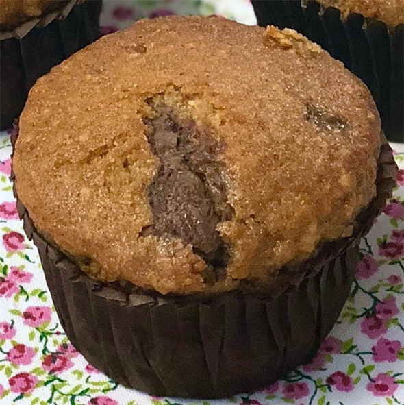 banana chocolate cupcake in a brown paper case