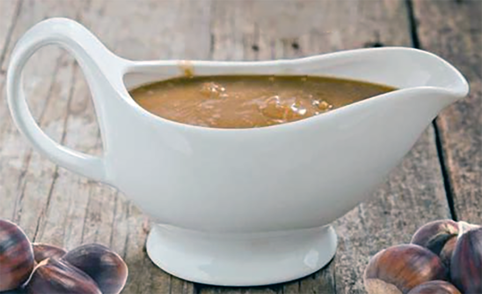 brown chestnut sauce in a sauce boat