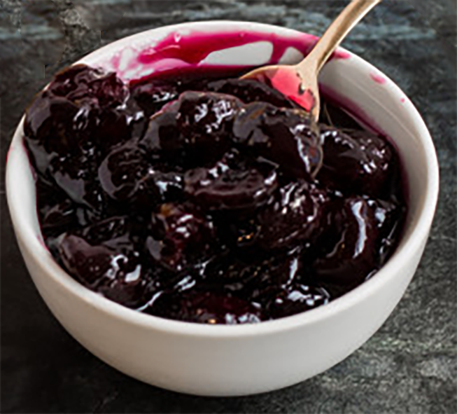 black cherry jam in a small bowl