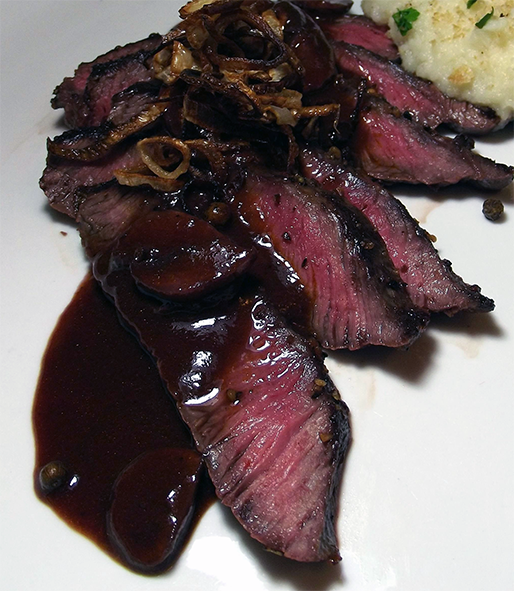 sliced steak topped with shallot, horseradish and mushroom ketchup sauce