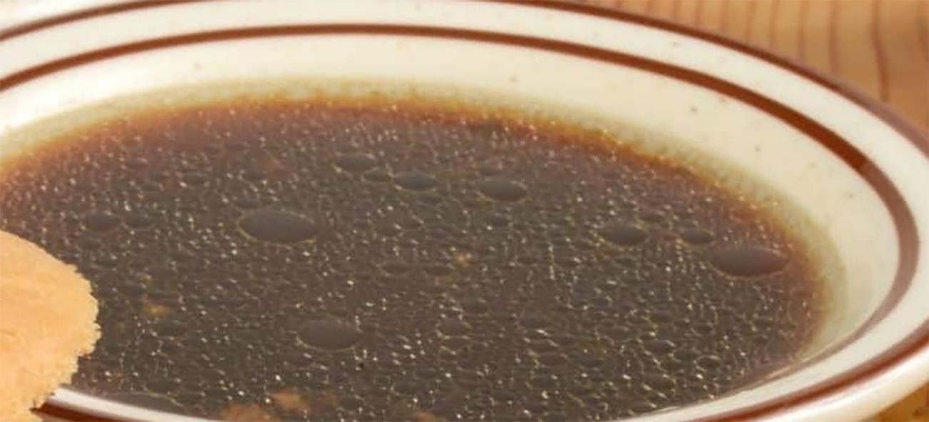bowl of beef roasting juices or jus