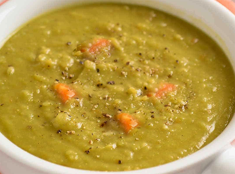 split pea, vegetable and mint soup in a soup bowl