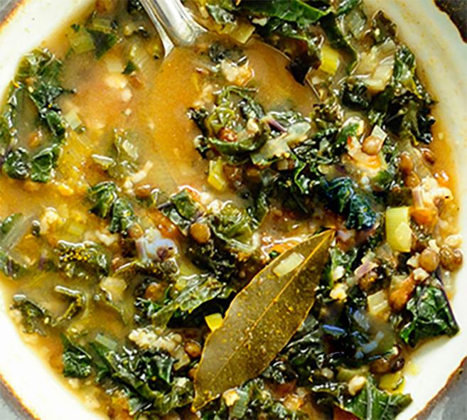kale brose soup with oatmeal garnished with a bay leaf