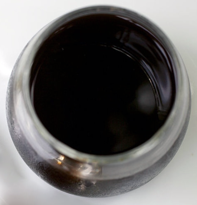 leamington sauce of walnut juice, vinegar, soy sauce and mushroom ketchup in a jar