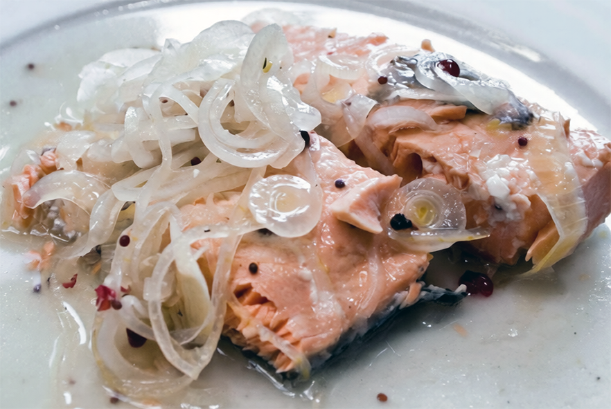 pickled salmon topped with onions