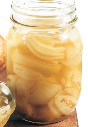 Pickled yellow onions in a jar