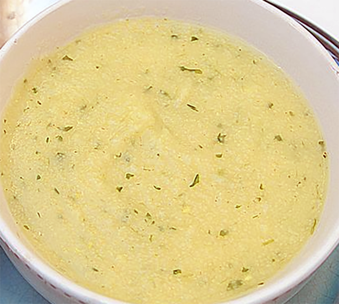 semolina soup in a meat stock base served in a bowl