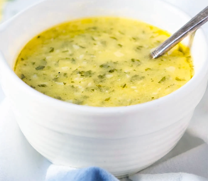celery and butter sauce in a white bowl