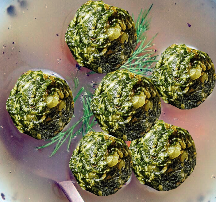 soup of spinach balls served in meat stock
