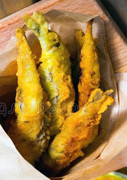 battered and fried sprats in a paper cone