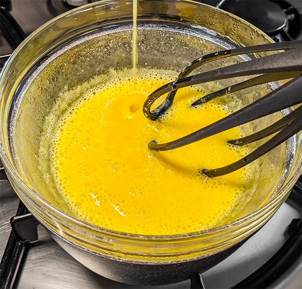 butter and egg liaison sauce in a bain marie