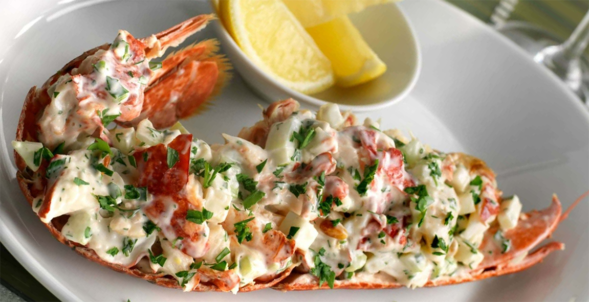 lobster meat dressed with parsley stuffed in a lobster shell