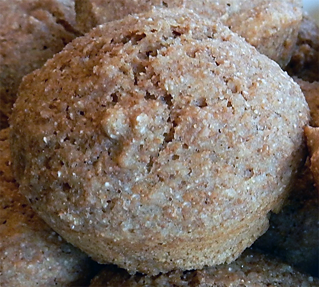 cassava flour and honey muffin on a pile of other muffins