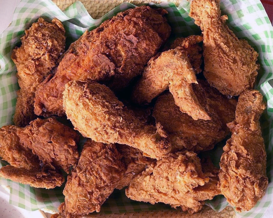 breaded and deep fried chicken portions in a basket