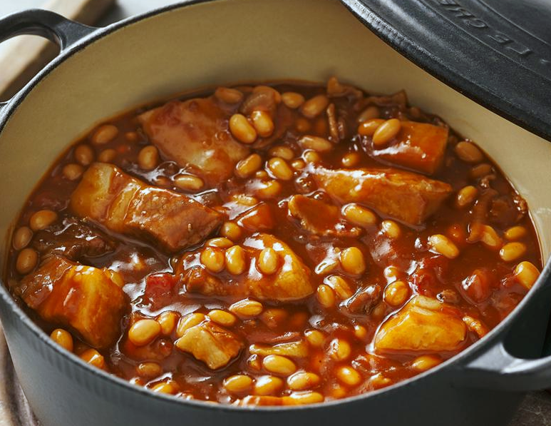 Boston baked beans with belly pork and marmite in a cast iron casserole dish