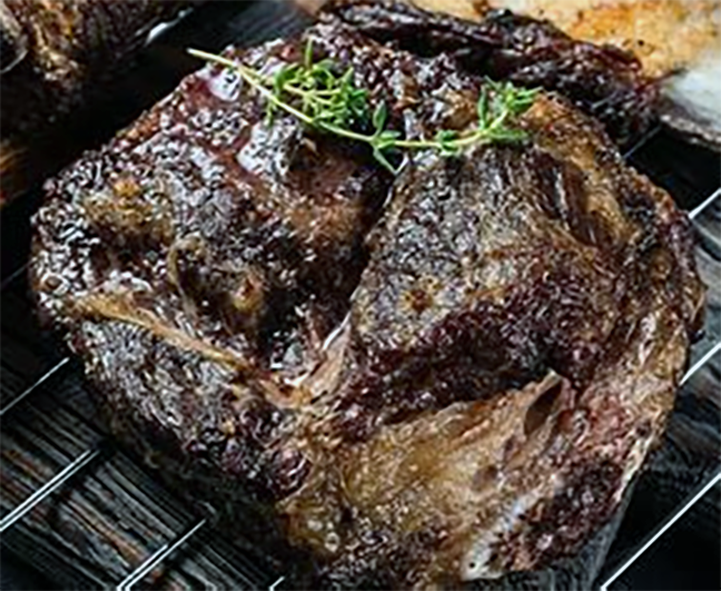 Botswanan spiced beef cooking on a barbecue