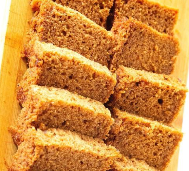 slices of brown sugar cashew snacking cake arranged on a chopping board