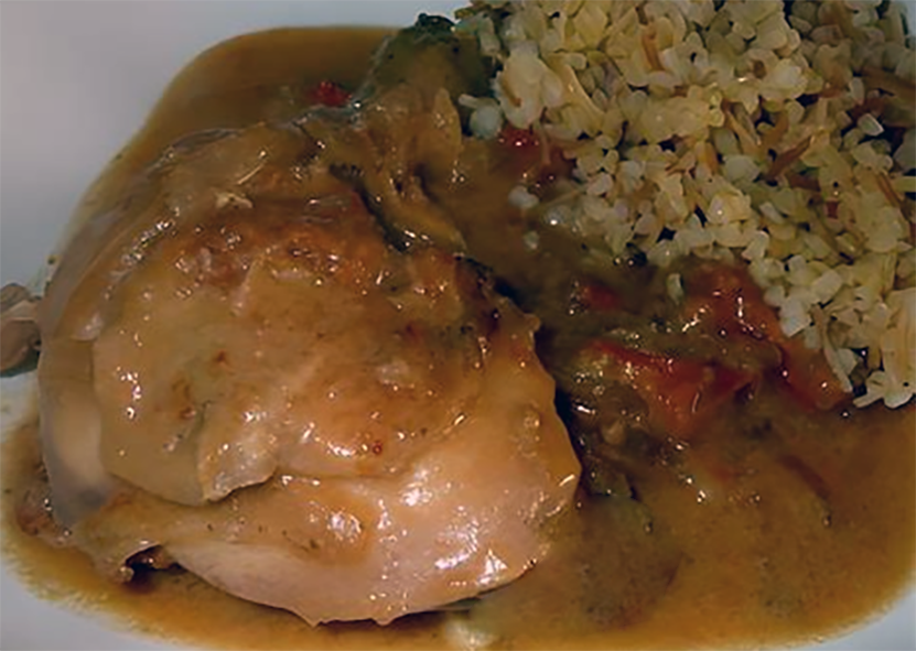 chicken in peanut sauce served with couscous