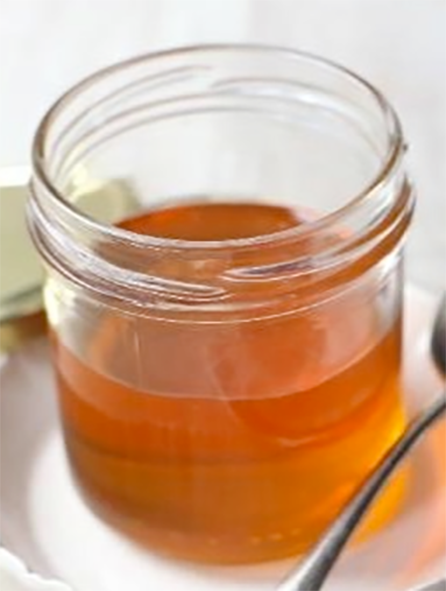 Canina honey in a glass jar