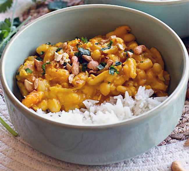 haricot bean curry served in a bowl with rice