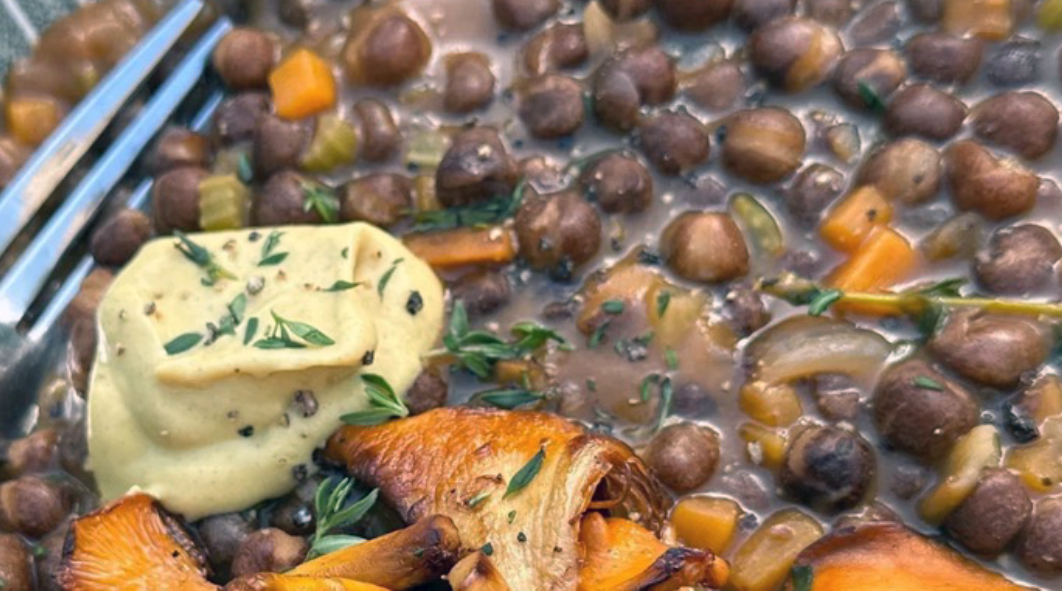 ragout of carlin peas with mirepoix and dijon mustard served topped with fried golden chanterelles