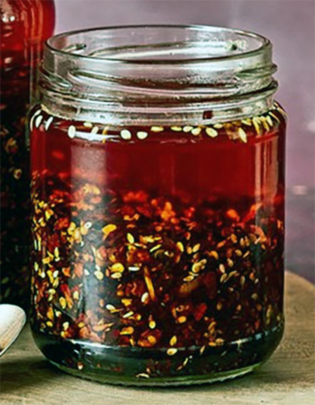 Chilli crisp in a small un-lidded jam jar