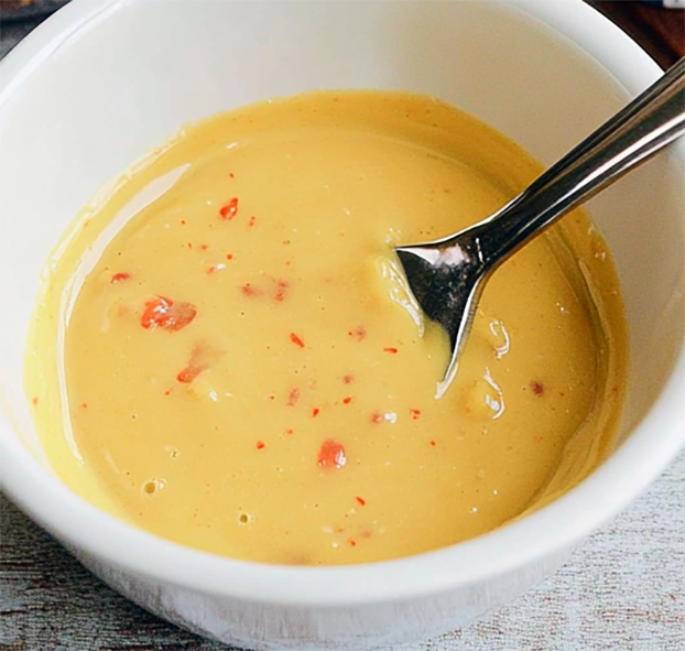 Chinese hot mustard in a small white dish