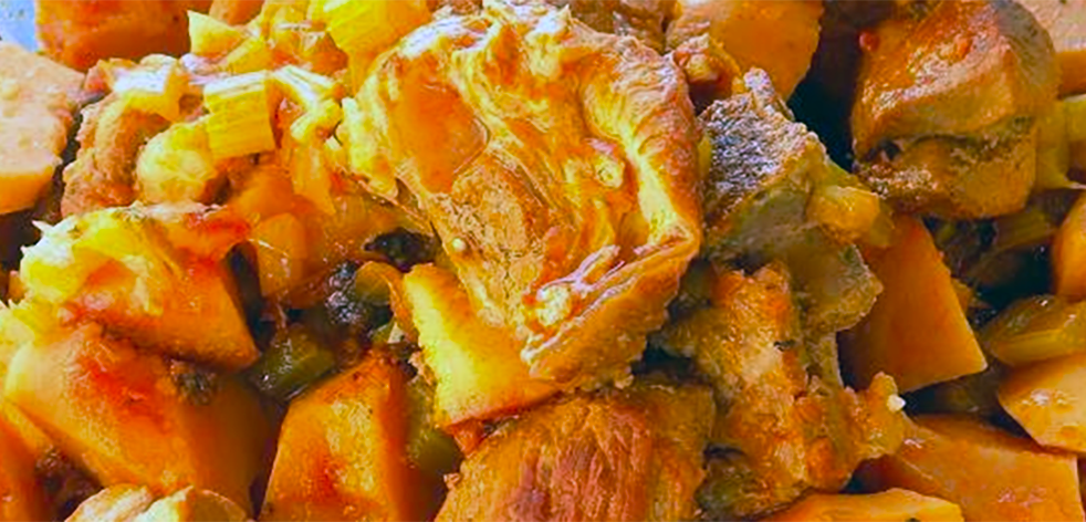 stew of pork with taro served on a plate