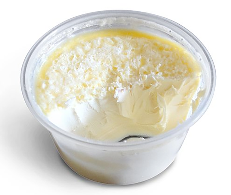 Clotted cream in a plastic tub